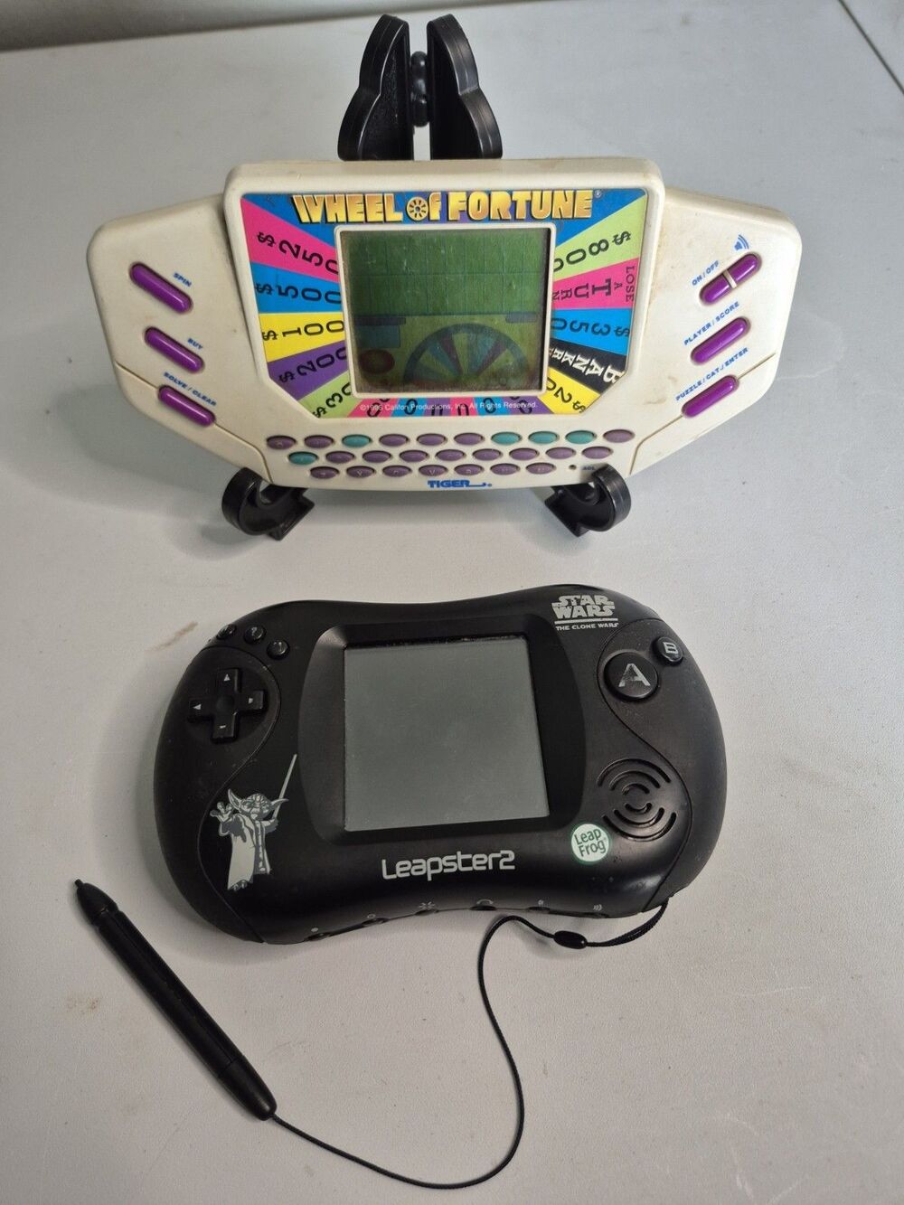 Handheld Electronic Game Lot – Leapster 2 + Wheel of Fortune Tiger – Untested /